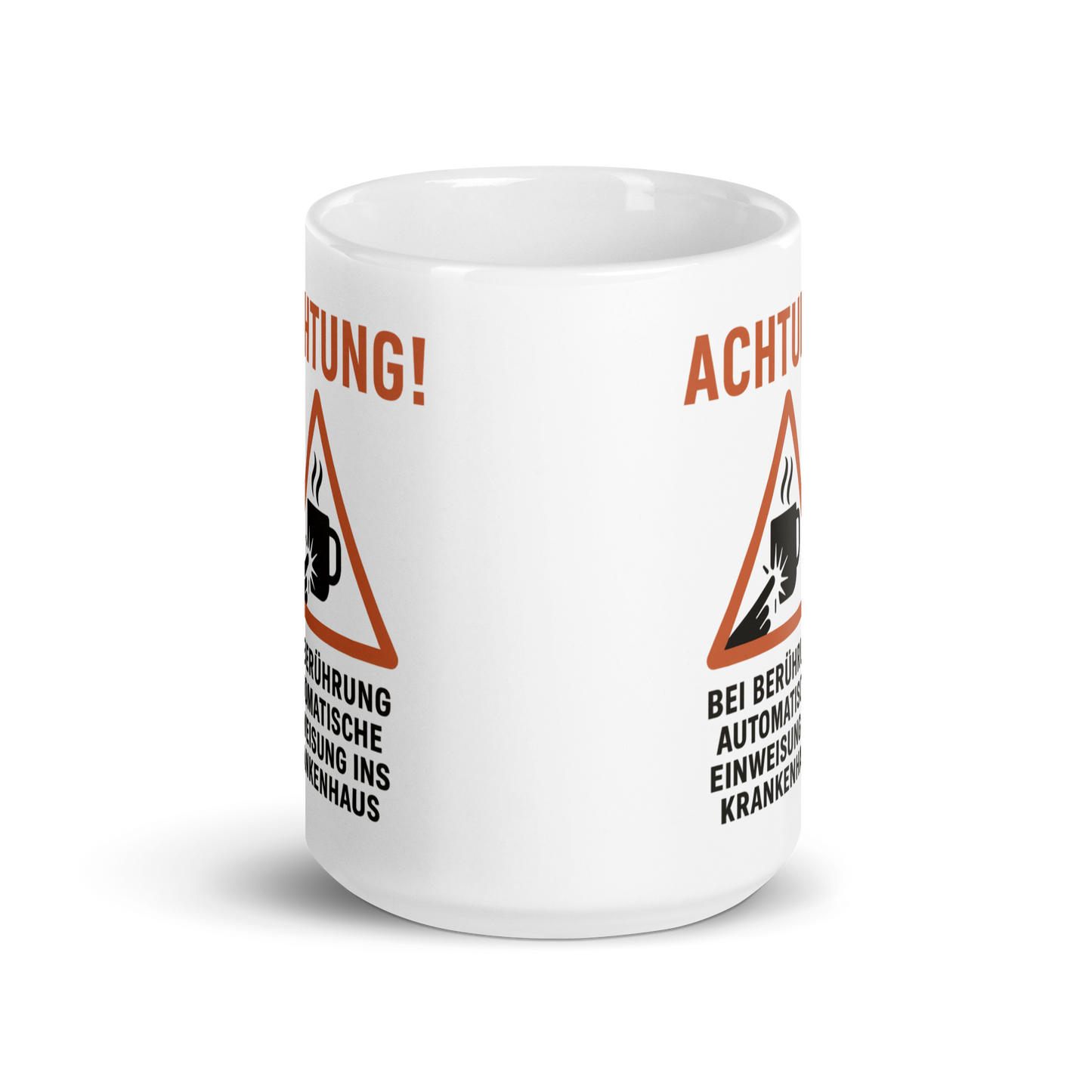 Kaffeetasse mit Warnhinweis – „Achtung! Bei Berührung: automatische Einweisung ins Krankenhaus“