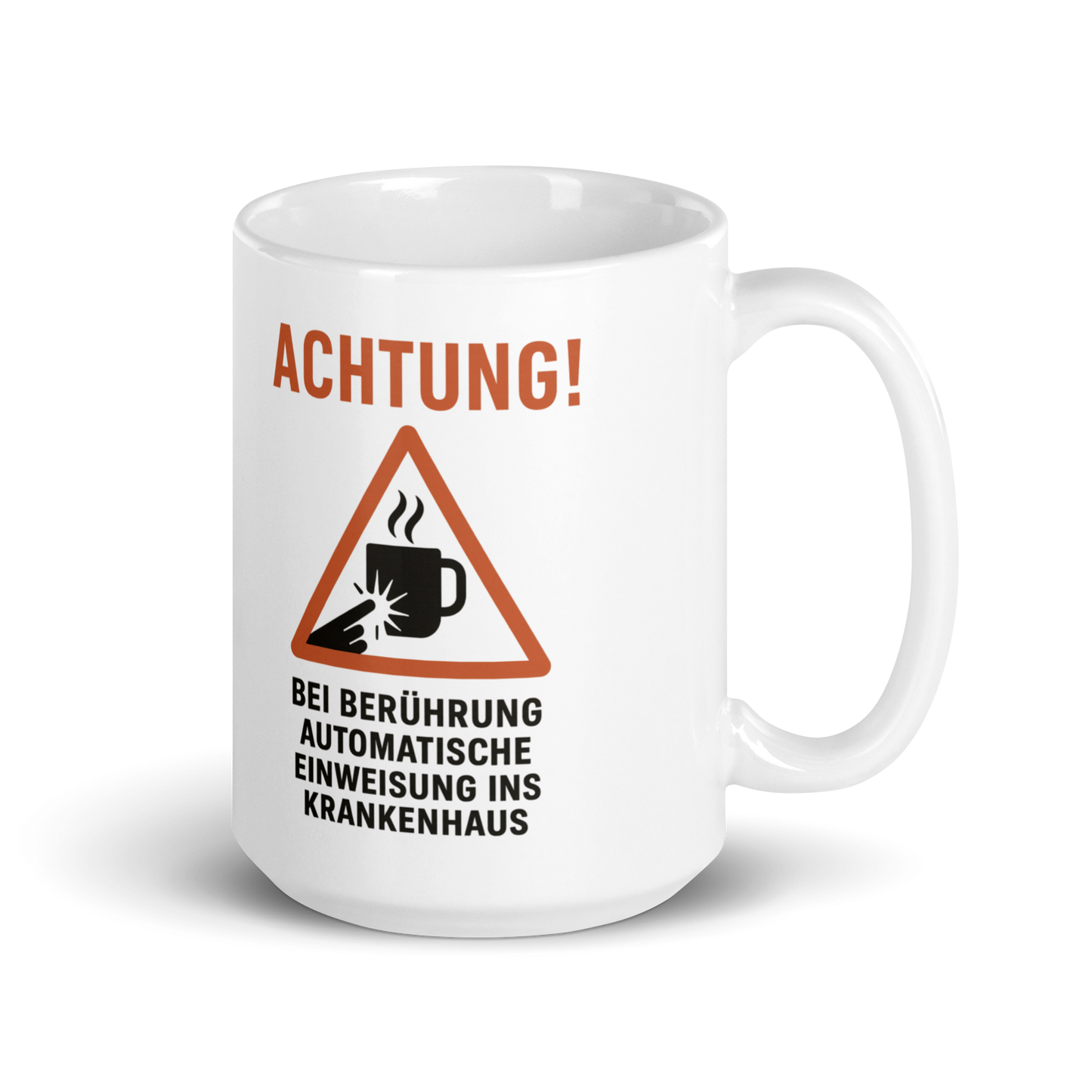 Kaffeetasse mit Warnhinweis – „Achtung! Bei Berührung: automatische Einweisung ins Krankenhaus“