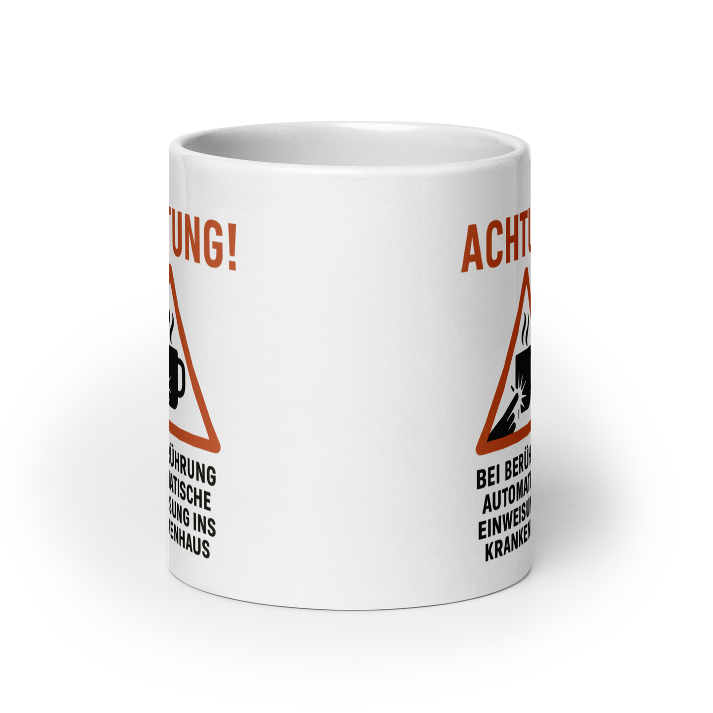 Kaffeetasse mit Warnhinweis – „Achtung! Bei Berührung: automatische Einweisung ins Krankenhaus“